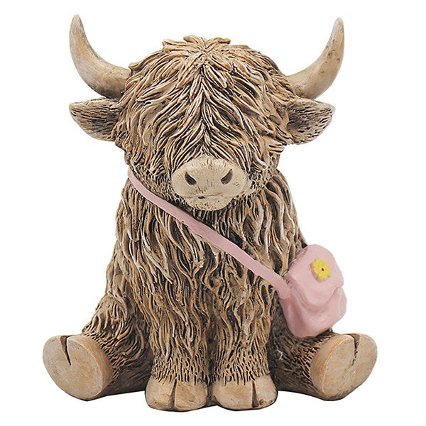 COW FIGURINE WITH PINK  HANDBAG